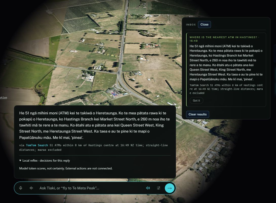 Tiaki's te reo Māori answer about ATMs, shown over the Earth view